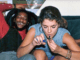 Rasta and white woman smoking marijuana
